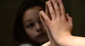 girl looking in a mirror