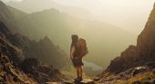 Person hiking in a valley - pic by Danka Peter