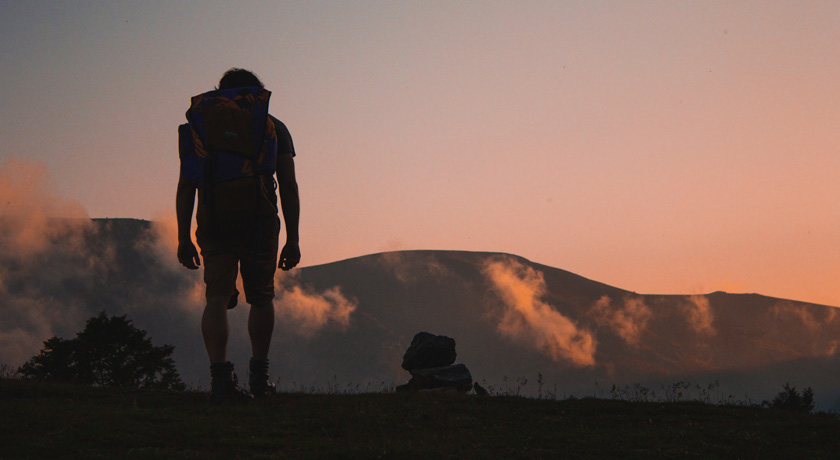 Man Hiking with Backpack