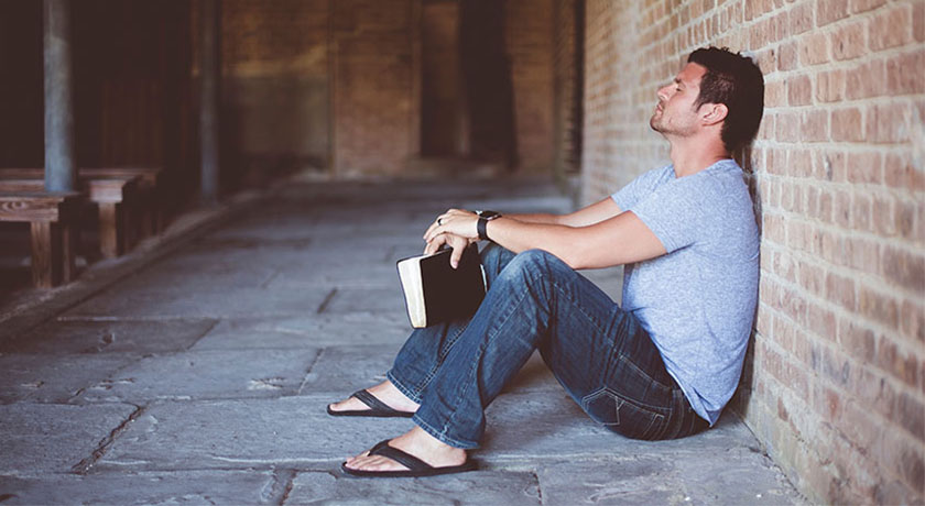 Man with Bible, picture by Ben White