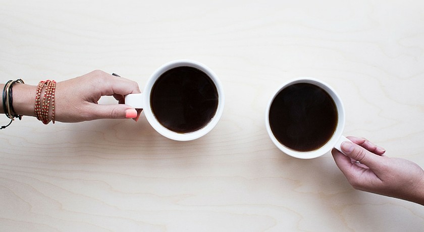 Two people having coffee