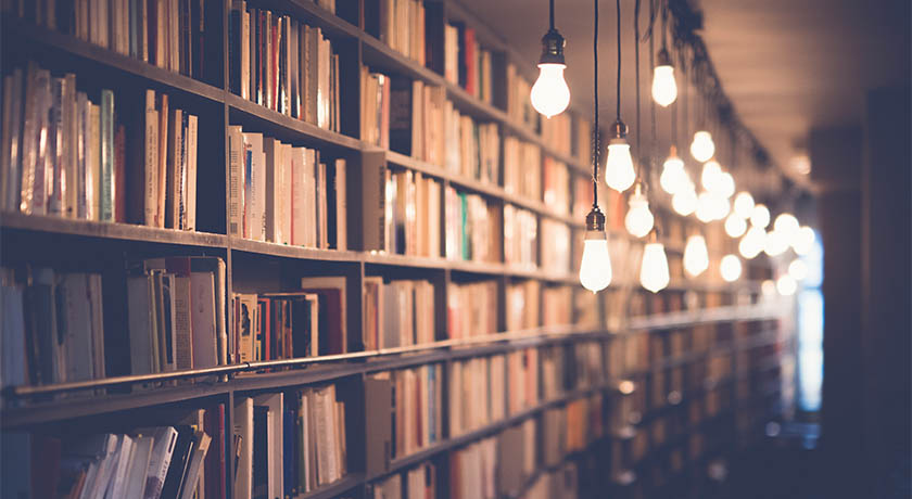 Library of books with globe lights