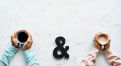 Couple with Black and White Coffees