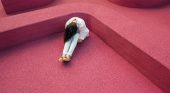 Woman with her head down, sad