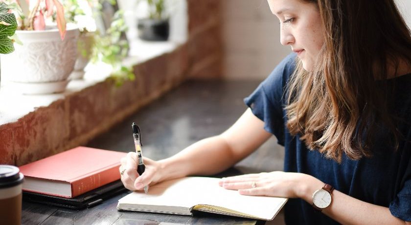 Woman Writing by Hannah Olinger