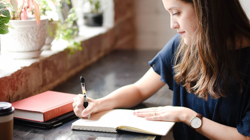 Woman Writing by Hannah Olinger